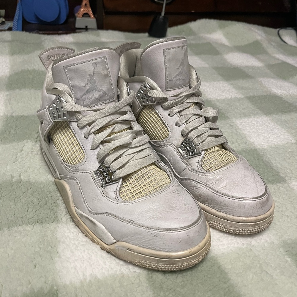 white and cream Jordan 4s. used. size 11